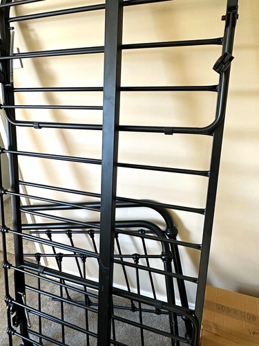 Black metal day bed and