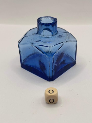 Old blue glass ink bottle