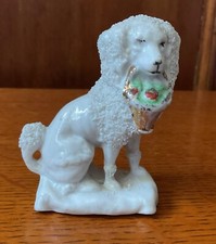 Miniature Porcelain Seated Poodle With Basket