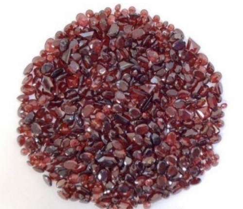 Red garnet over - red, carats
