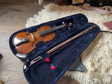 Small brown Forenza viola with case included. Bow needs restringing :)