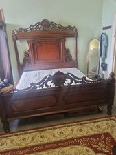 Large antique emperor bed.