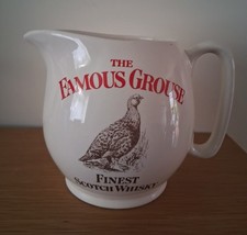 A Famous Grouse Whisky water jug, by Wade