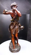 Antique spelter figurine named