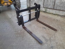 Strimech floating pallet tines on JCB Q Fit Brackets, Telehandler, Manitou