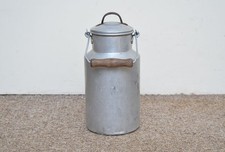 Vintage old aluminium milk