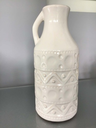 Large white embossed vase