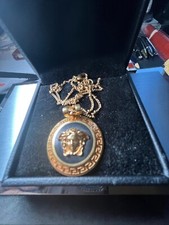 Versace gold toned necklace/Excellent condition.