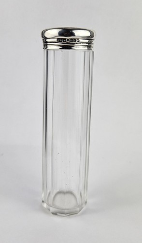 Silver topped glass bottle - topped,
