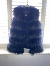 raccoon fur gilet