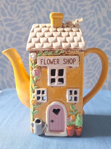 Village pottery teapot - village,