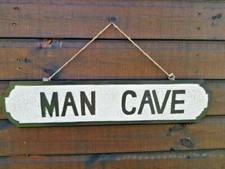 MAN CAVE SIGN (HAND CARVED & PAINTED). WALL HANGING