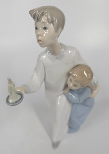 Lladro boy and - and, with