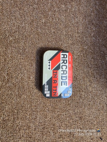 Arcade tin - in, a