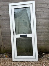 white upvc door with frosted