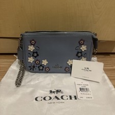 Coach Tea Rose Wristlet – Baby Blue – Elegant & Feminine