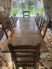 French Oak refectory dining table and chairs adjusts to seat 6,8 or 10 people. 