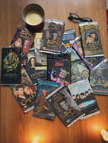 Film trading card packs - &,