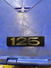 Suzuki  TS125K Side Cover Badge Emblem NOS 68141-28600 very rare!! NOS.  B12