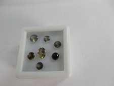 Kornerupine, 7pcs, shades of green to yellowish green, 2.46cts total