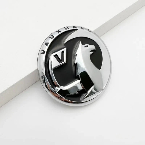 Black metal car badge - metal,