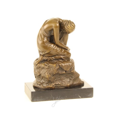 Bronze sculpture woman sitting