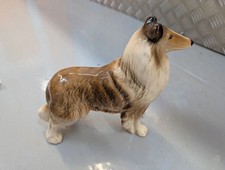 A Figurine of a Rough Collie