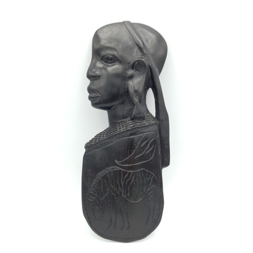 African carved wood wall