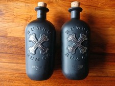 Pair of Bumbu XO Rum Bottles. Empty. Pirate Theme.