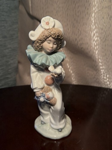Nao lladro bird in hand - a,