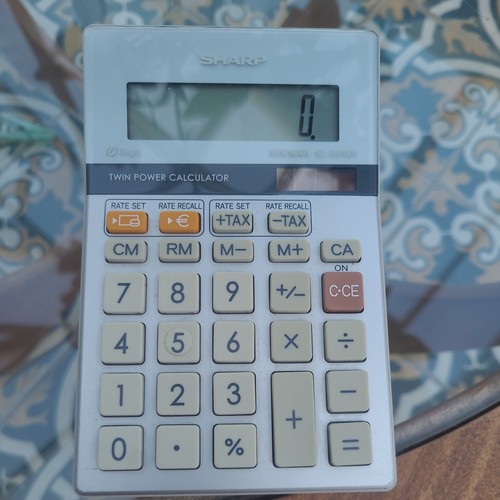 Sharp calculator elsi - sharp,
