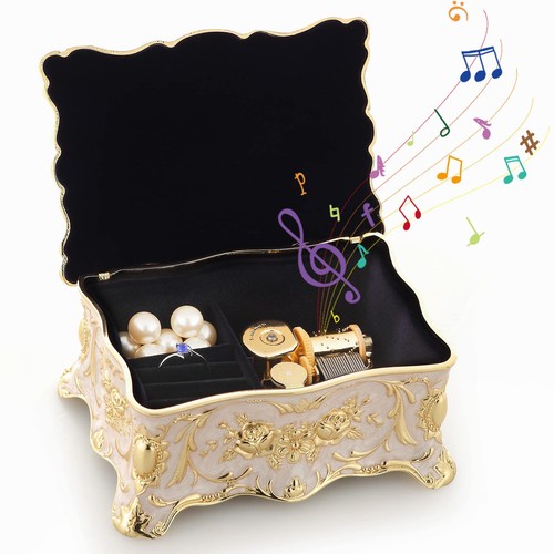 Embossed metal music box - embossed, wind