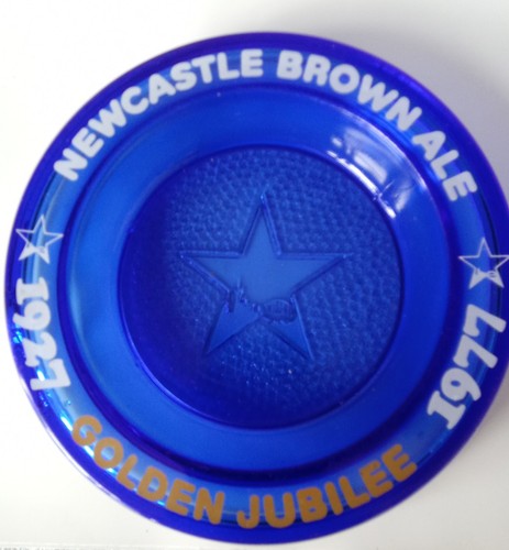 Newcastle brown ale golden - brown,