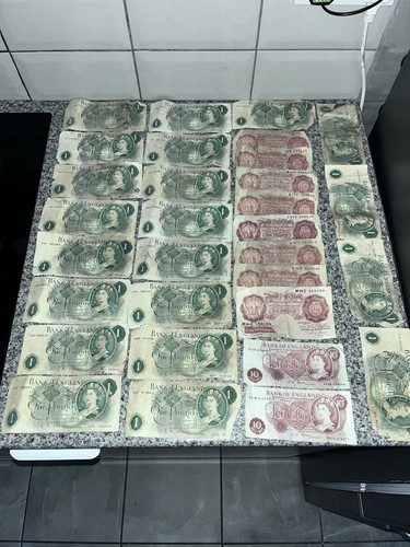 Six old one pound notes - one,