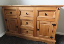 Solid pine Corona sideboard - 2 door 5 drawer, used.