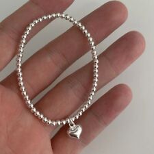 Genuine Sterling Silver Heart Charm Beaded stretch Bracelet for Women.
