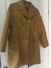 Vintage coat. 1960s /70s vinyl/pvc. size 10. mustard, belted double breasted 