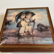 Vintage M.J.Hummel Music Box Stormy Weather plays “somewhere over the rainbow” 