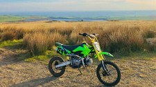 125cc green and gold Monster Pit dirt bike motorcycle