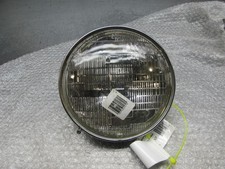 Suzuki GT250 Circa 1974-1976 Motorcycle Headlamp Headlight Glass And Rim 