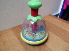 1 X TESCO CAROUSEL UNISEX SPINNING TOP TOY, INTERACTIVE COLOURS & BALLS.