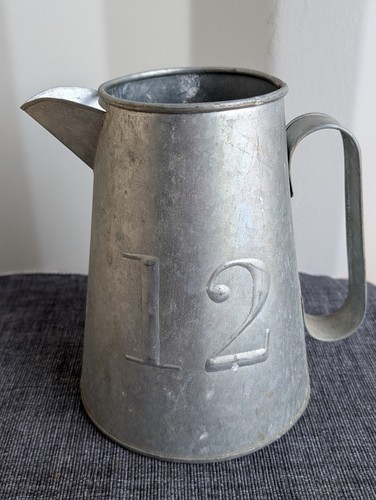 Decorative large tin water jug