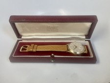 Garrard 9ct gold case gents watch with original box