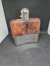 A Vintage Leather And Glass EPNS Hip Flask