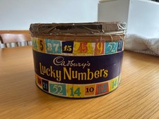 cadburys lucky numbers 1980s biscuit tin cylindrical