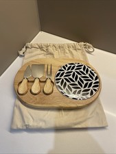 Cheese board with knives