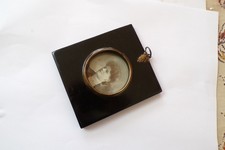 an antique miniature frame