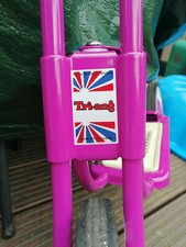 Triang Tri-ang sun logo head