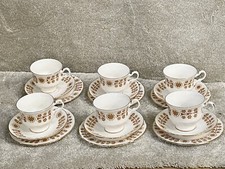 VINTAGE TEA CUPS AND SAUCERS