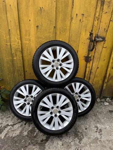Mazda alloy wheels set with - mazda,